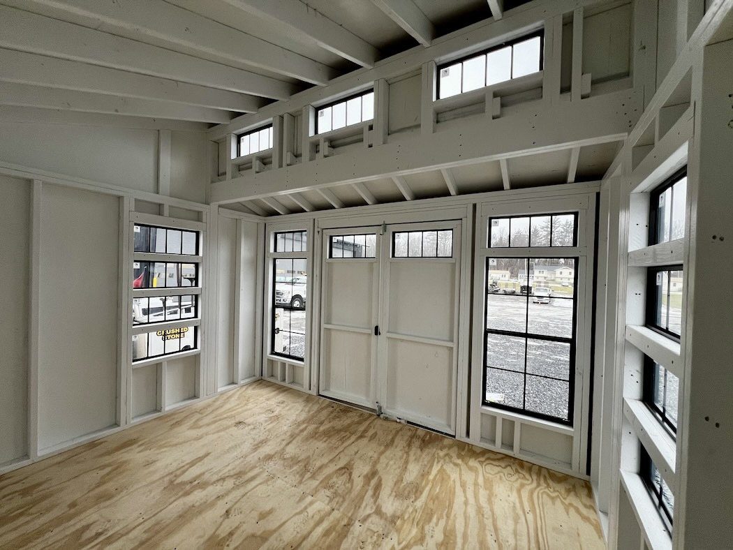 Ridgeview Studio Lean To shed bright interior with transom windows