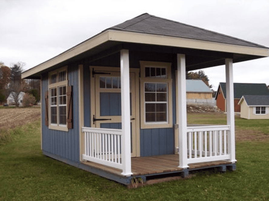 Victorian Hip Roof Shed with double doors, Z-style shutters, and Victorian hardware